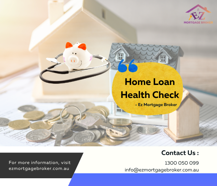 A diverse group of four people, including a man and three women, sitting around a table with a laptop, documents, and coffee cups. They appear to be discussing finances or a business plan in a modern office setting.